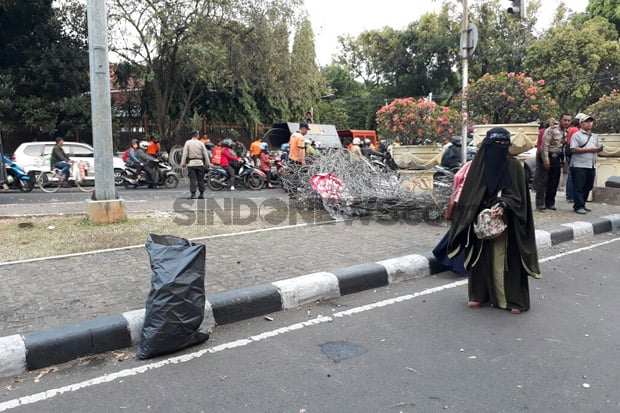 Usai Aksi Solidaritas untuk Rohingya, Massa Punguti Sampah