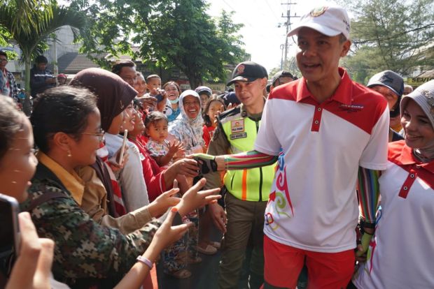 Peraih Emas Asian Games Disambut Bak Artis, Gubernur Jateng Justru Jalan Kaki