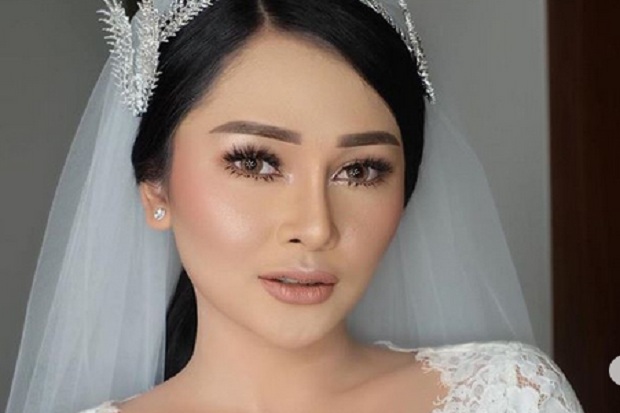 Mutia Ayu Akhirnya Pamerkan Foto Nikah dengan Glenn Fredly