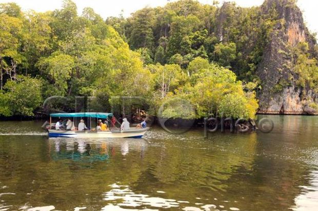 Jalan-jalan Hemat Keliling Indonesia dengan 6 Trik Ini